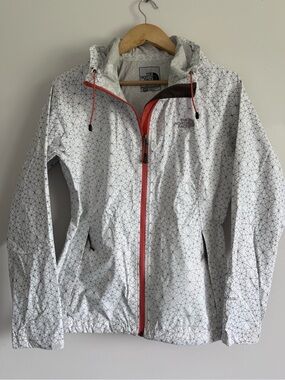 The North Face HyVent 2.5L White Geometric Rain Shell with Bright Orange Accents